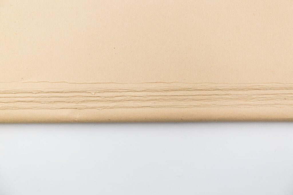 這是啟明文房的仿手工的機製毛邊紙